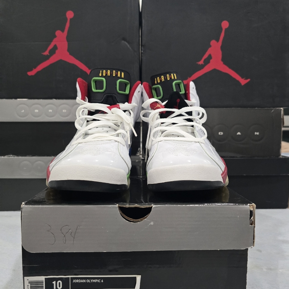 This is a pair of Air Jordan 6 Retro "Olympic" sneaker